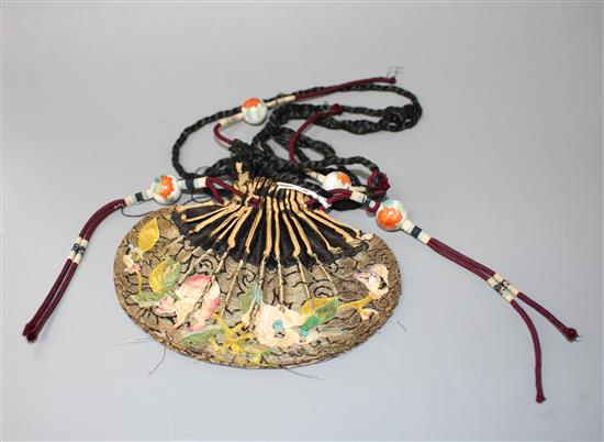 A Chinese silk purse and with four enamelled porcelain beads, late 19th century, purse 12.5cm wide